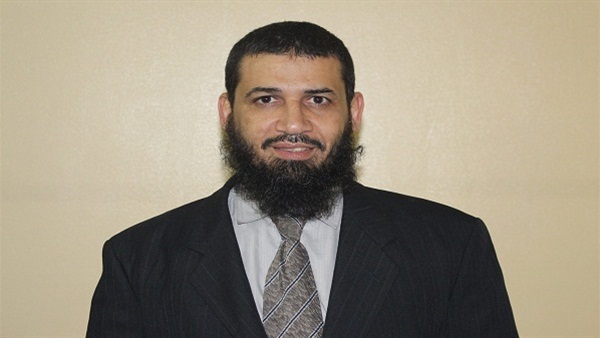 على معوض، محامي الجماعة
