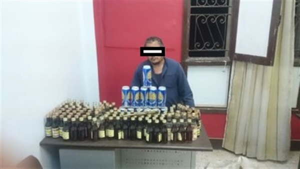 عبوة خمور بحوزة عامل