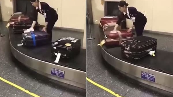 موظفة في المطار بحقائب