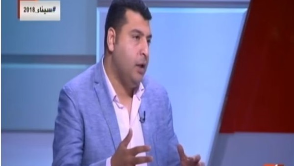 الكاتب الصحفي محمود