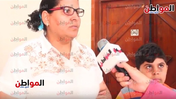 والدة طفل مريض بضمور