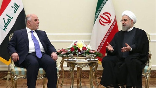 الرئيس الإيراني مع