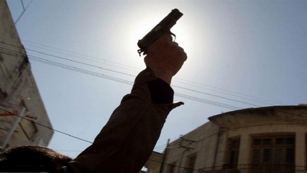 ضبط مسلح تبادل إطلاق