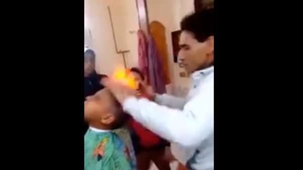 حلاق بالولاعة والبنزين