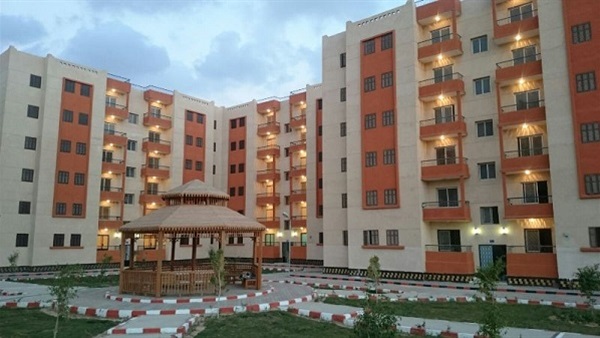 تسليم وحدات الإسكان