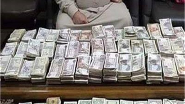 صبط تاجر عملة